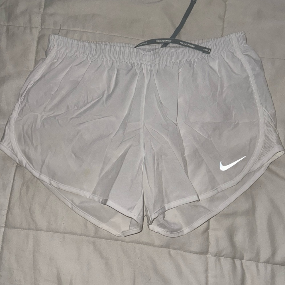 White Nike workout shorts size M. Built in lining